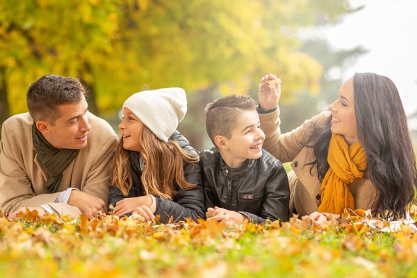Family in leaves 
